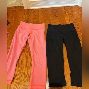 Lululemon melon orange/pink and black over the knee women’s leggings size 4